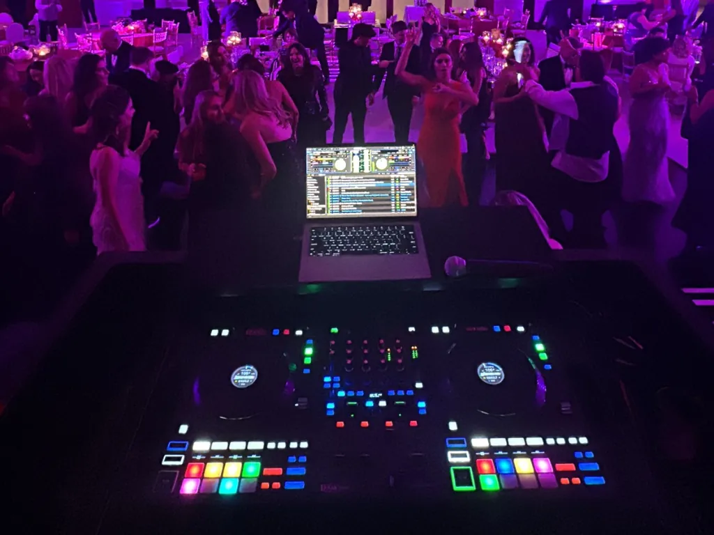 The view from DJ Lowso’s controller over a full dance floor at a Make-A-Wish gala at Balboa Bay Resort in Newport Beach